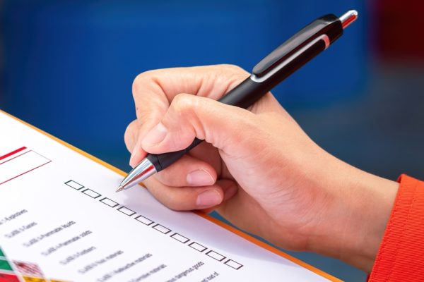 A,Safety,Engineer,Is,Using,Pen,To,Rating,The,Health